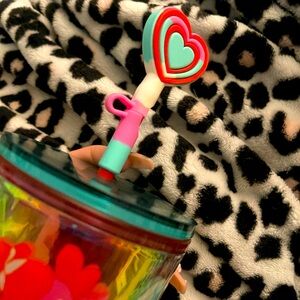 Starbucks cup with  topper